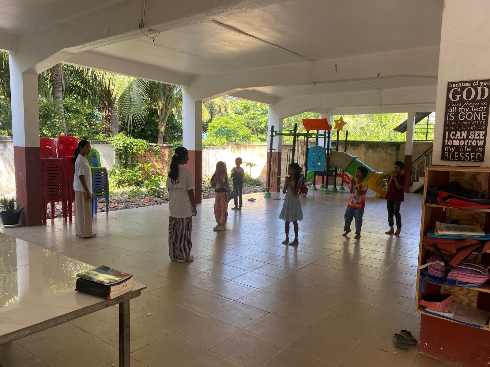 The covered linkway joining the canteen and hall to the main school block