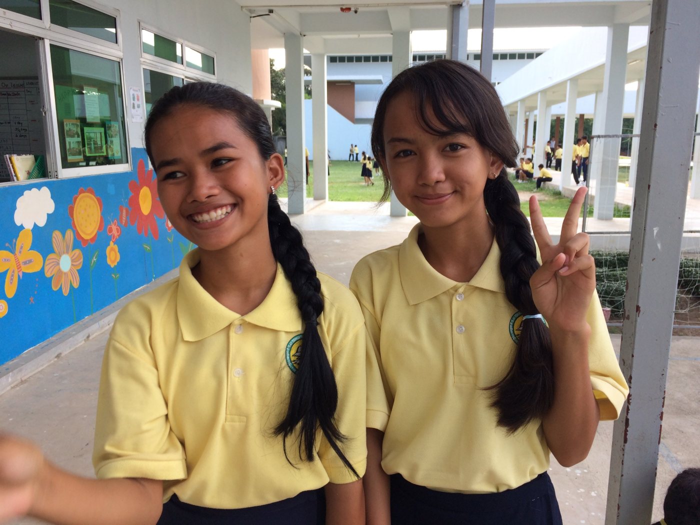 GTIS students smiling warmly in school uniforms